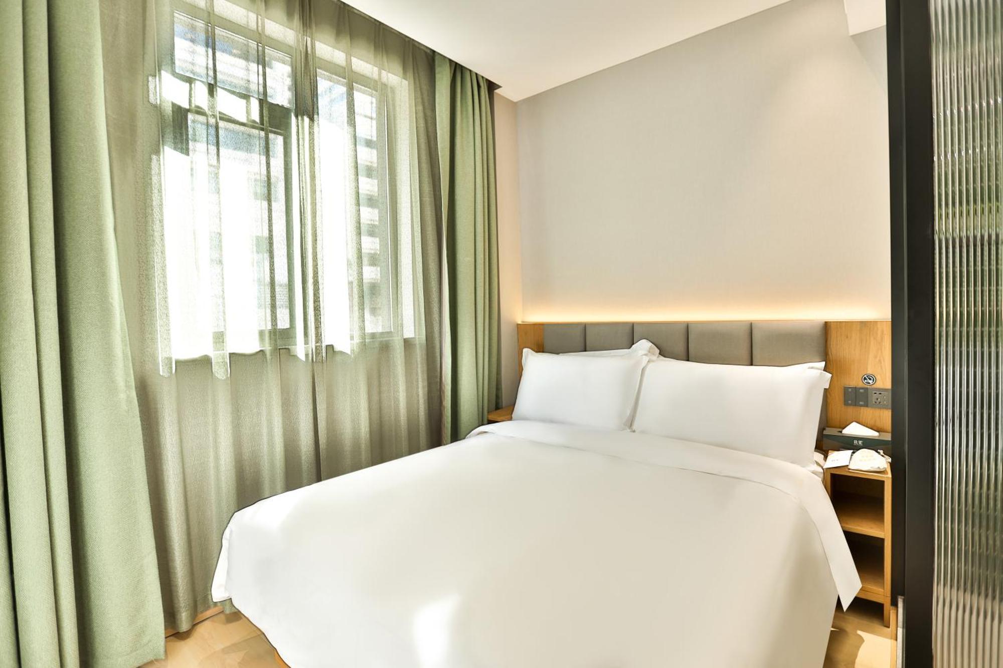 True Go Hotel - Shanghai Jing'An Temple Nanjing West Road Extérieur photo